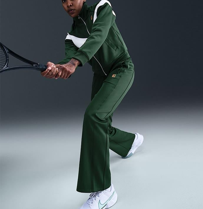 شلوار تنیس زنانه نایک NikeCourt Heritage Windrunner - سبز شلوار تنیس زنانه نایک NikeCourt Heritage Windrunner - سبز - Image 3