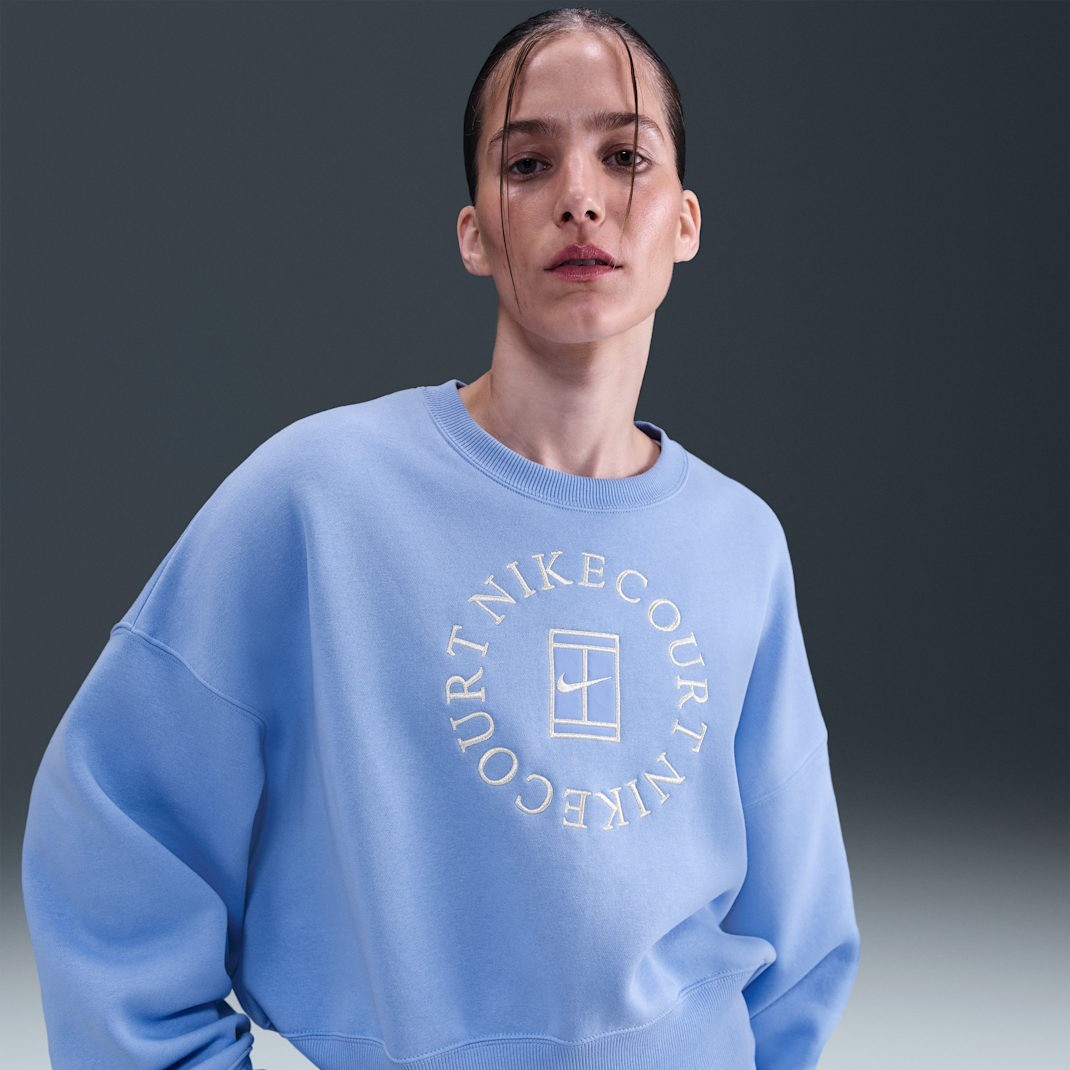 سویشرت تنیس زنانه نایک NikeCourt Heritage Phoenix Fleece - آبی سویشرت تنیس زنانه نایک NikeCourt Heritage Phoenix Fleece - آبی