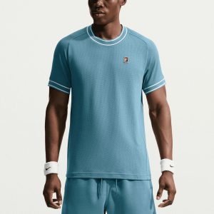 تیشرت تنیس مردانه نایک NikeCourt Heritage Logo – آبی دودی تیشرت تنیس مردانه نایک NikeCourt Heritage Logo – آبی دودی