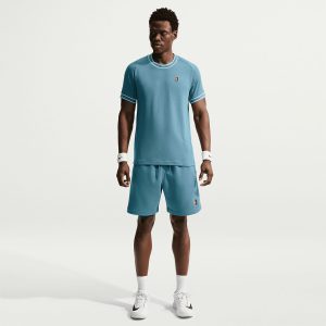 تیشرت تنیس مردانه نایک NikeCourt Heritage Logo – آبی دودی